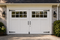 The Lexington Classic White Swing-Out Garage Door